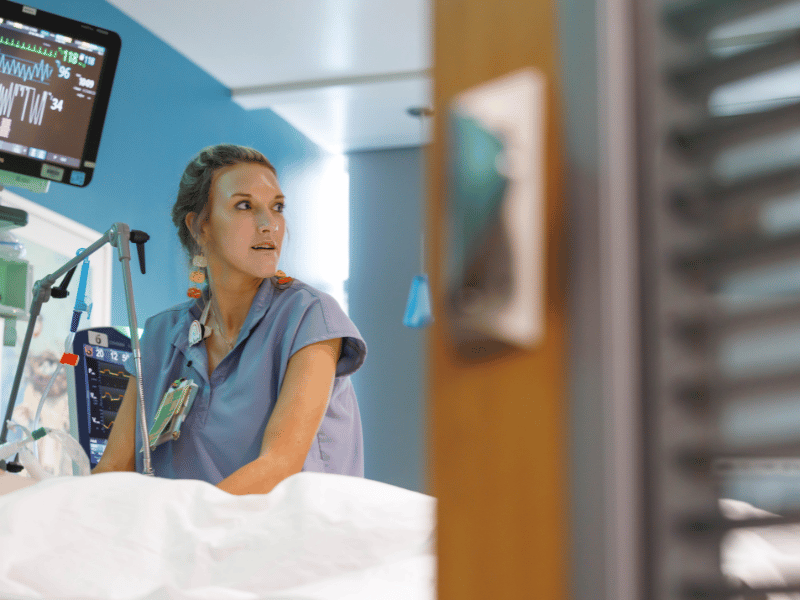 Registered Nurse Alexis Gaines takes care of a patient in the PICU, where nurses won their unit a Beacon Award for Excellence from the American Associaton of Critical-Care Nurses. The award recognizes care as well as work environment and the nursing workforce. Melanie Thortis/ UMMC Photography 